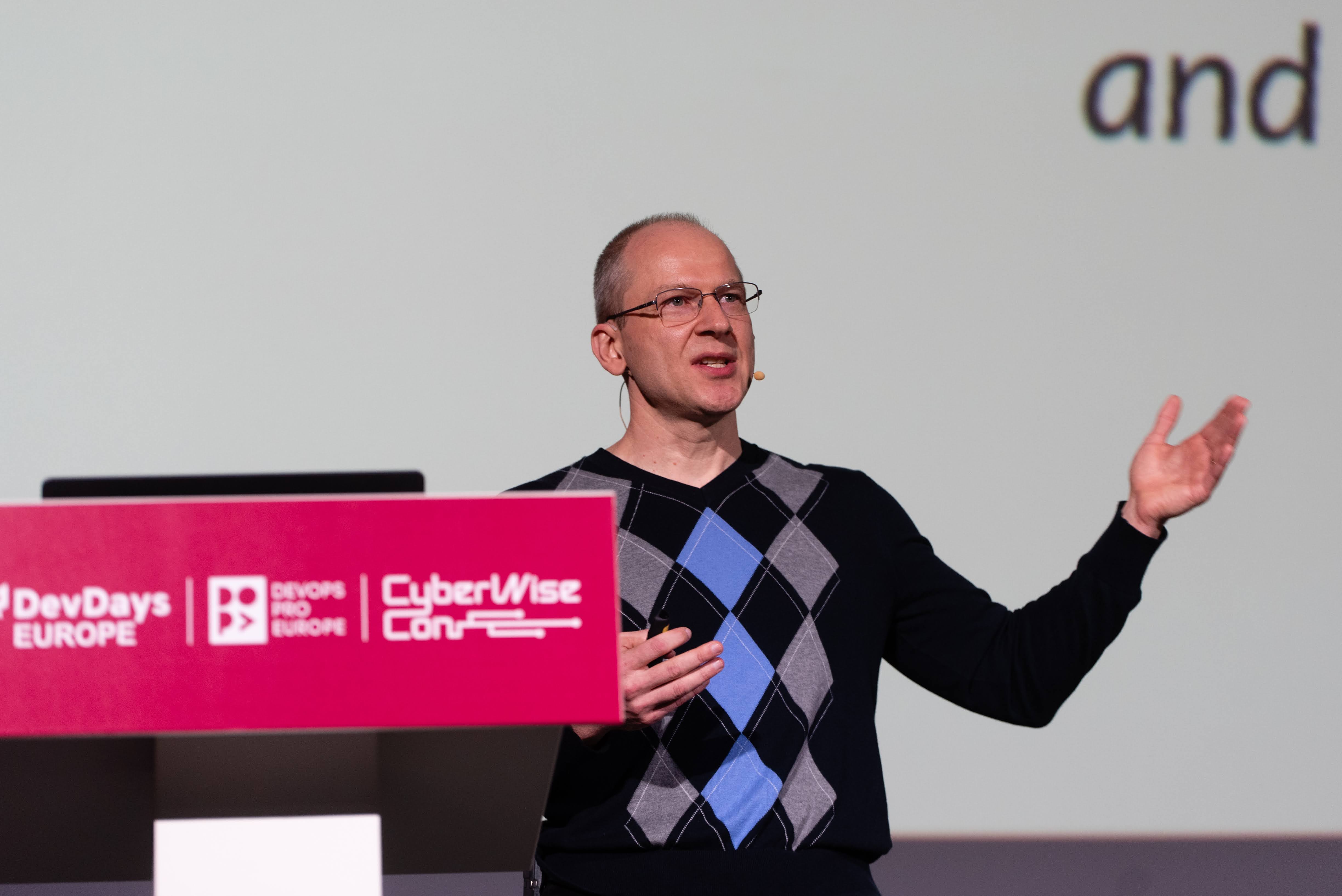 Victor on stage presenting.